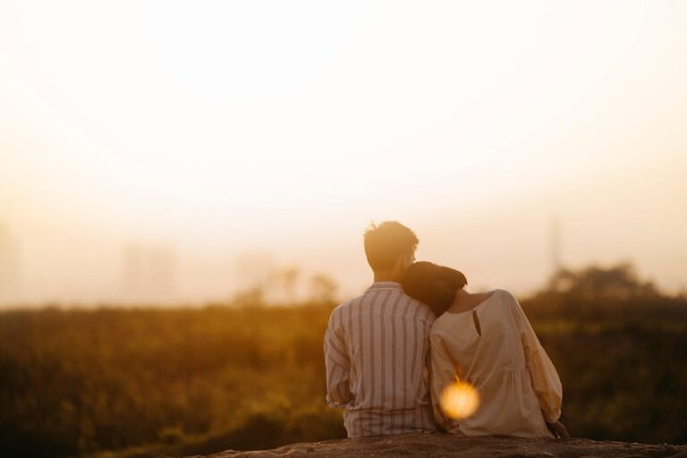 A couple enjoys a serene moment together during a sunset in Gia Lai, Vietnam.